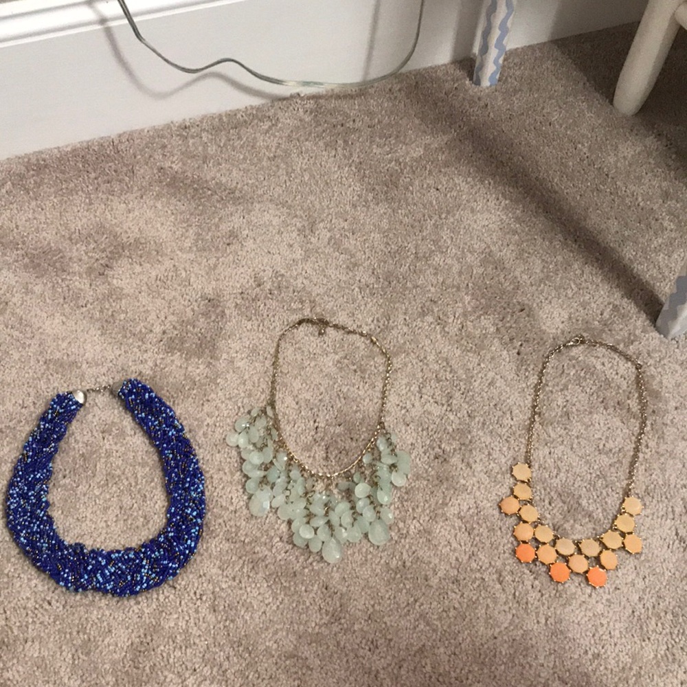 Three statement necklaces